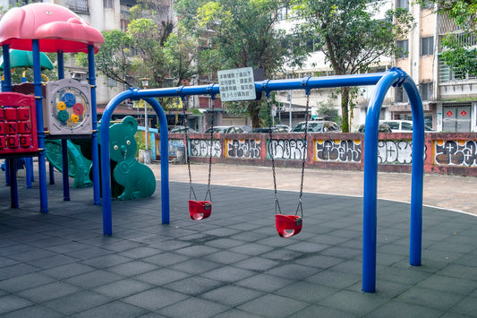 a playground with blue and red bars